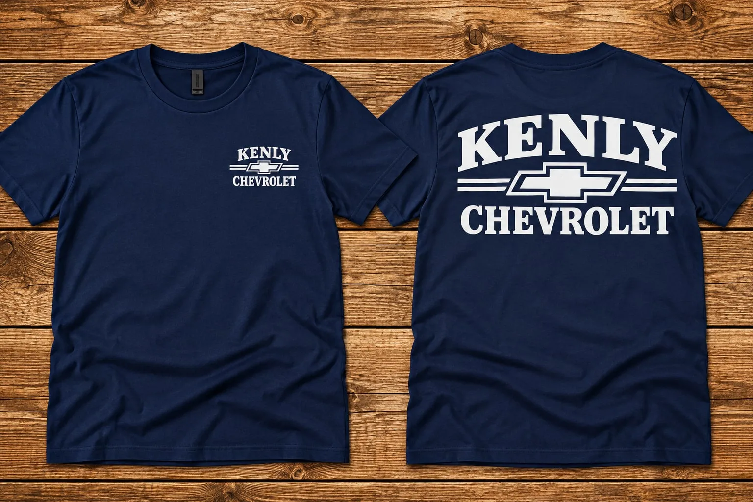 Navy t-shirt shown front and back: a small white Kenly Chevrolet logo on the chest and a large one across the back.